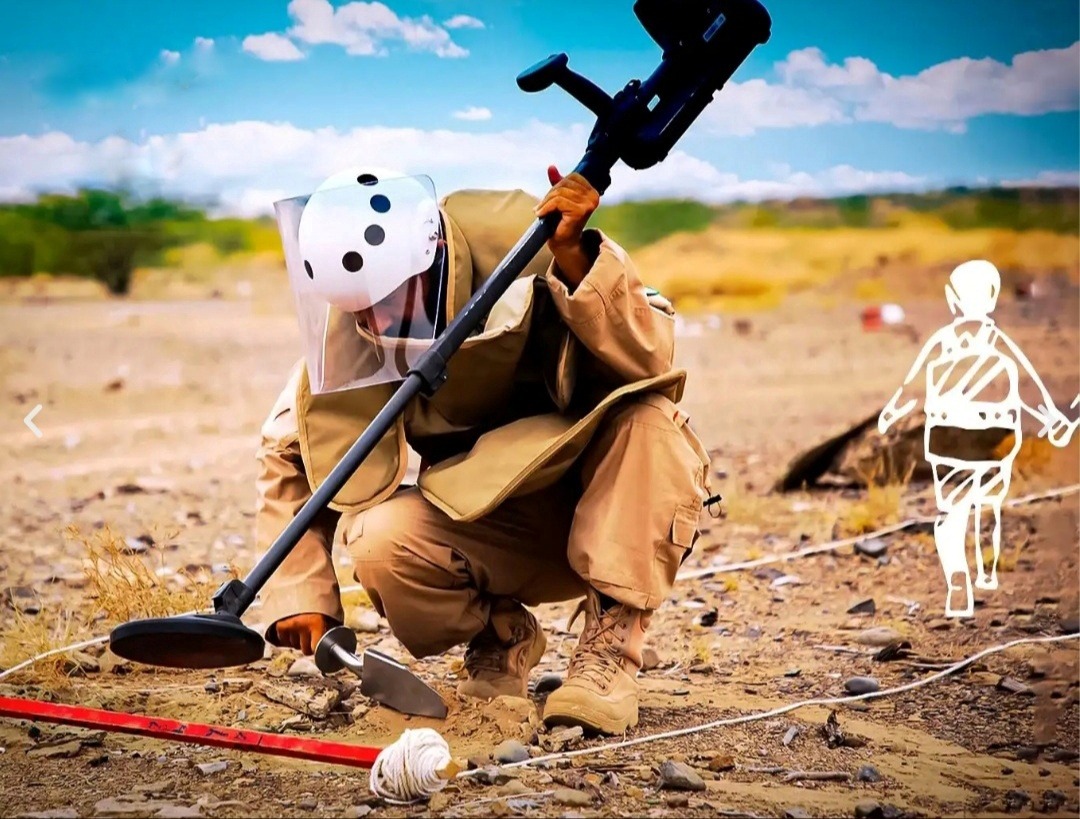 A worker in Masam removes mines in Yemen