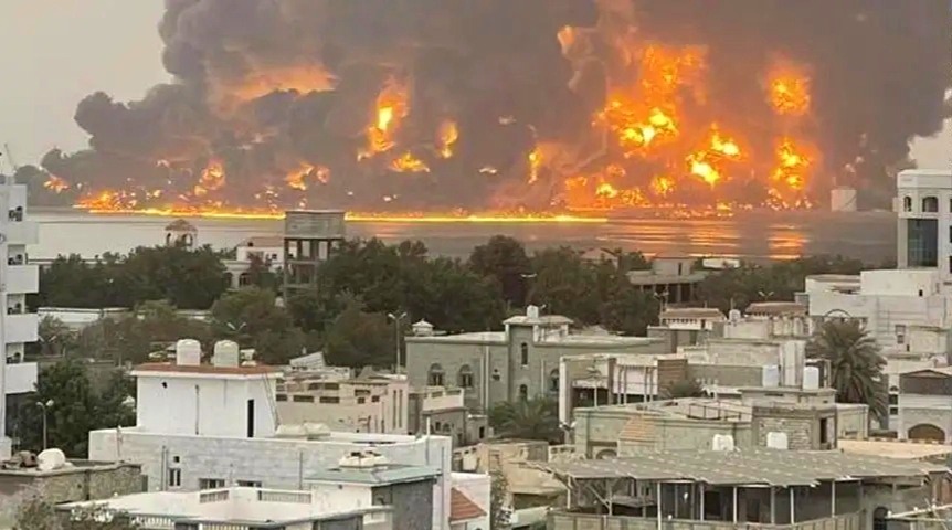 Part of the fires that broke out after the raids on Hodeidah