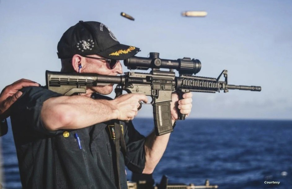 US Navy Captain Relieved of Duty After Photo of Him Holding Gun Backwards Goes Viral