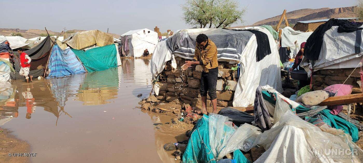 Storm-damaged homes of displaced people in Marib