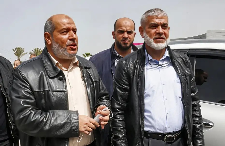 Rouhi Mushtaha (right) and Khalil al-Hayya at the Rafah crossing, March 15, 2021 (AFP)